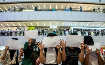 Hong Kong Protesters Let Blank Signs Do the Talking as New Law Bites