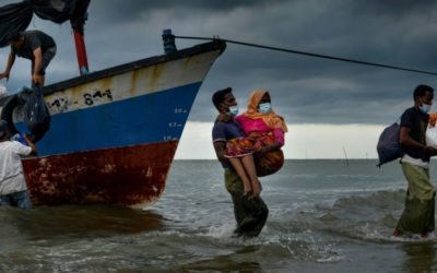 Stranded Rohingya Refugees Saved to Shore by Indonesian Fishermen