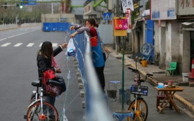 Virus-Hit Wuhan Waits for Barriers to Come Down