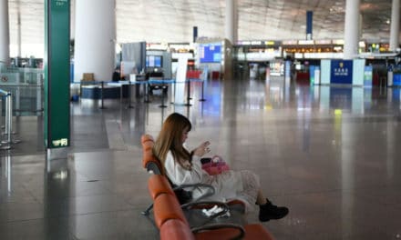Chinese Students Fleeing Virus Face Uneasy Reception Back Home