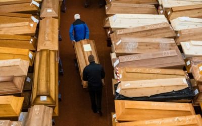 Coffins, Fear and Desperation: The COVID Frontline in 10 Pictures