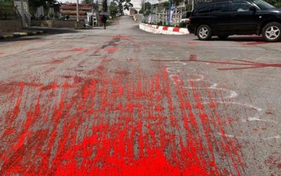 Myanmar Activists Splash Red Paint to Protest Junta Bloodshed