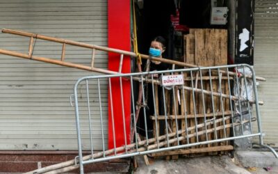 Beer Crates and Broken Chairs: Barricades Divide up Locked-Down Hanoi