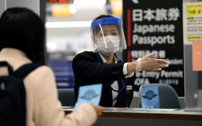 Japan Politician Apologizes for $87,000 Masks Price Gouging Auction