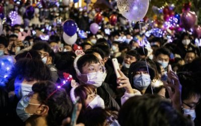 Crowds Throng Wuhan, Where Pandemic Began, to Celebrate New Year